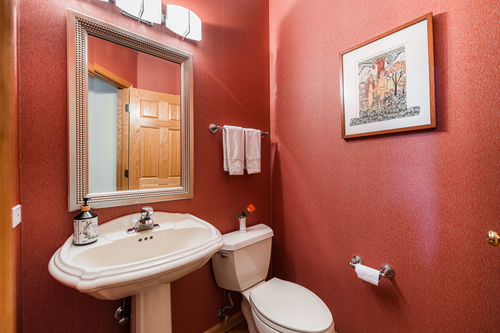 1607 Park Ridge Point Park Ridge, IL 60068 - Photo 11 of 41 a bathroom with a toilet sink and mirror
