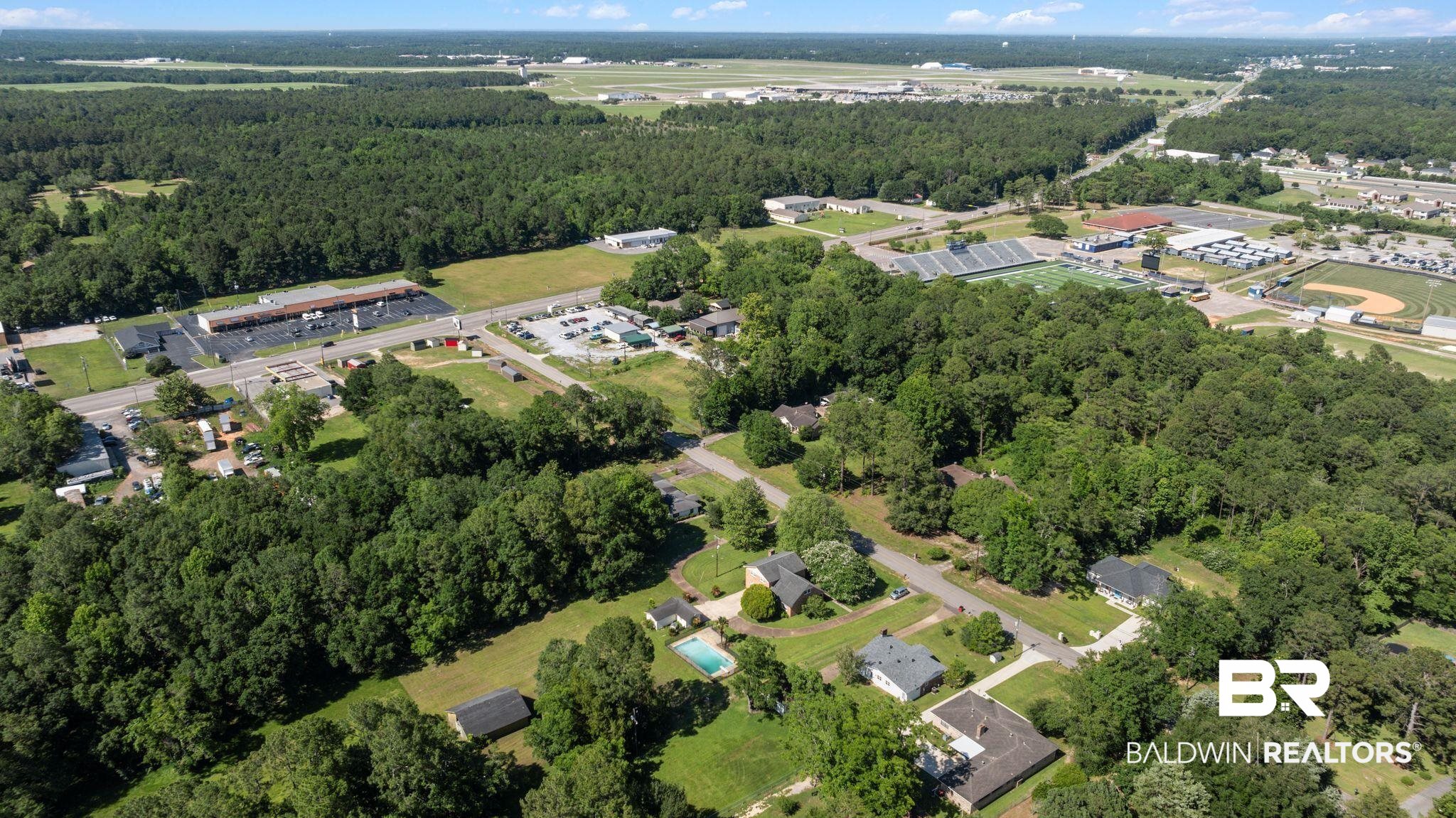 950 Walter Smith Road Mobile, AL 36695 - Photo 45 of 51 Aerial view of property and surrounding area with a forest