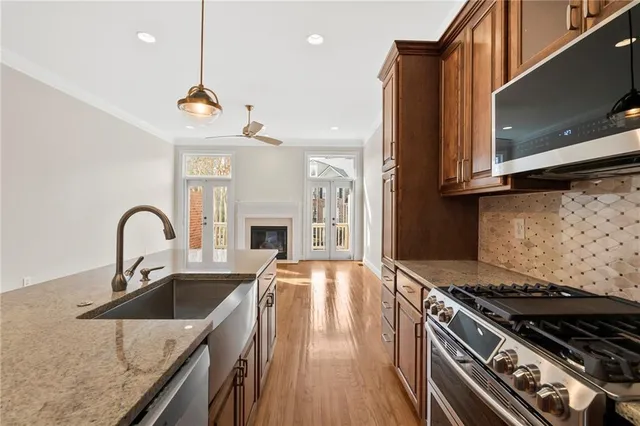 a view of entryway with stairs and wooden floor