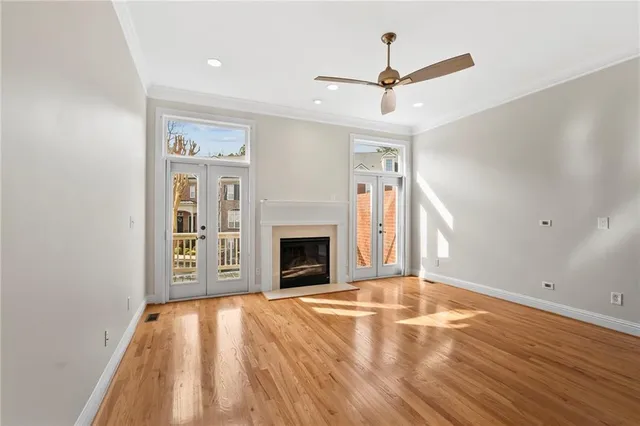 a spacious bathroom with a double vanity sink and mirror
