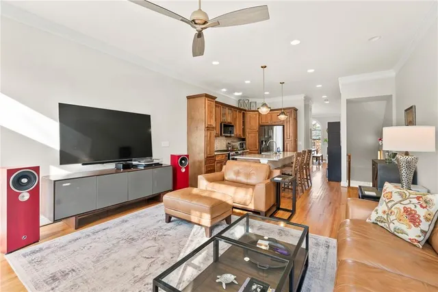 a bathroom with a tub a sink and a mirror