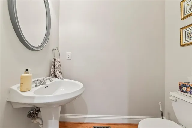 a view of a kitchen from the hallway