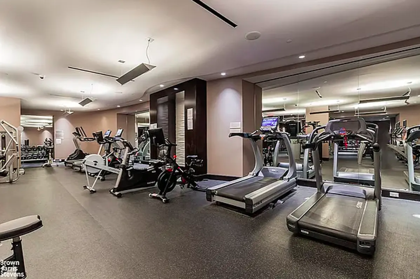 100 Riverside Boulevard, Unit 8J Manhattan, NY 10069 - Photo 6 of 10 a view of a room with gym equipment