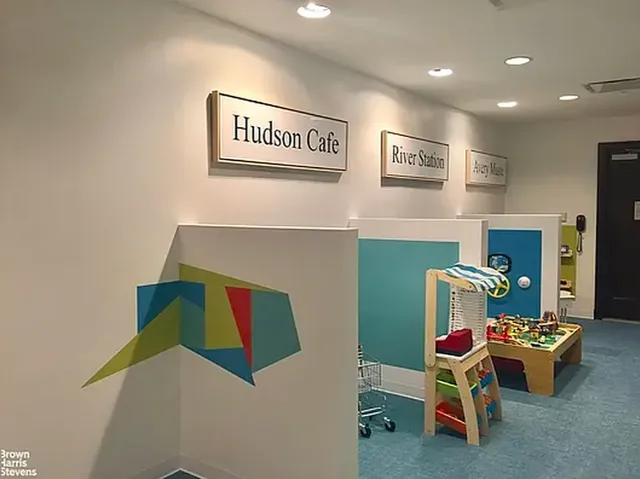 a room with furniture and a large window