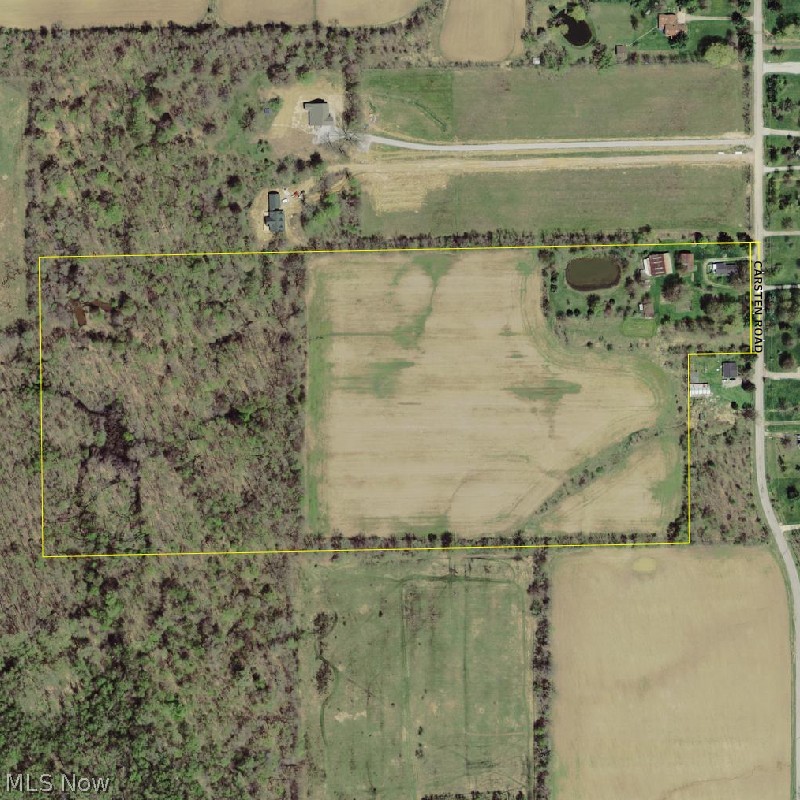 6078 Carsten Road Medina, OH 44256 - Photo 6 of 7 THIS AERIAL SHOWS THE LAYOUT OF THE PROPERTY WHERE YOU SEE THE POND, OPEN PASTURE/FARM LAND AND WOODS TO THE REAR W/AN ADDITIONAL 5+ ACRE LOT TO THE REAR (WEST) END OF THE LOT - BEYOND THE YELLOW PROPERTY LINE.