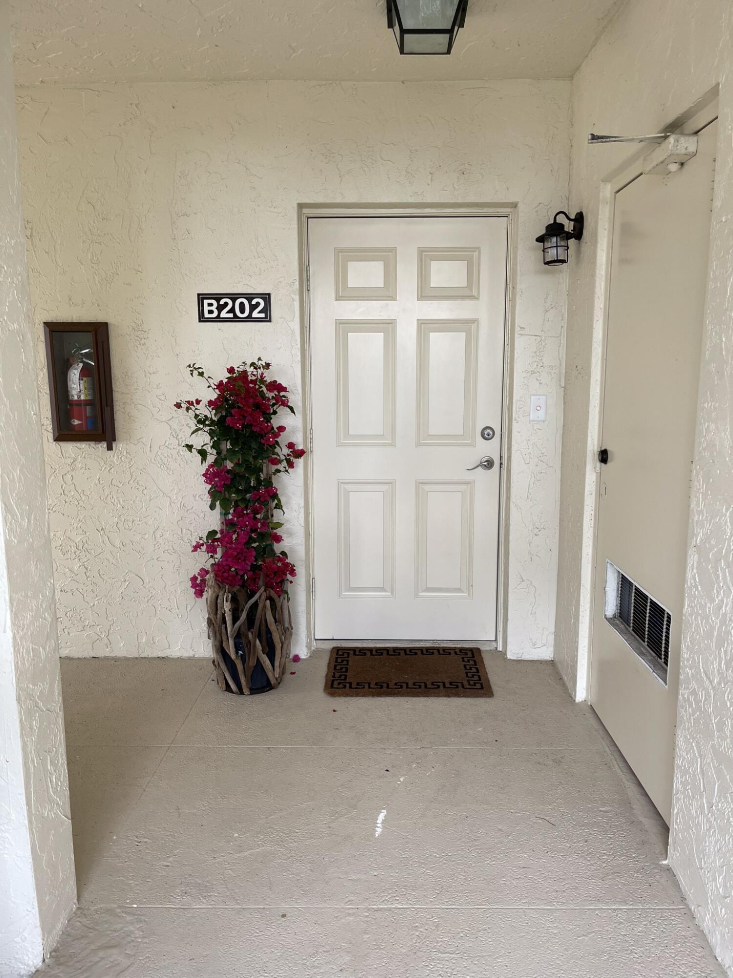 13388 Polo Club Road, Unit 202 Wellington, FL 33414 - Photo 2 of 38 Front Door