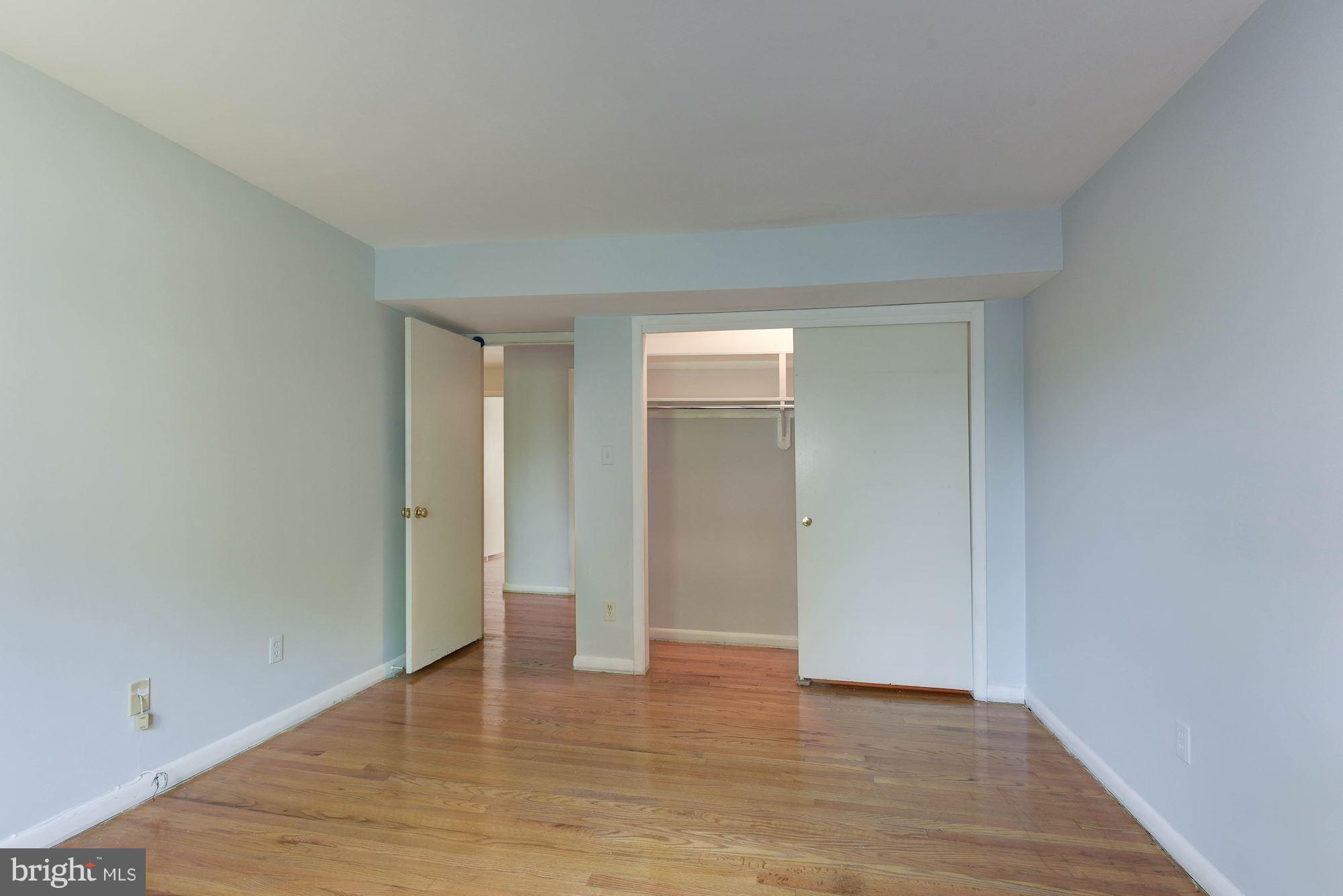 2148 Military Road Arlington, VA 22207 - Photo 19 of 28 a view of an empty room and wooden floor