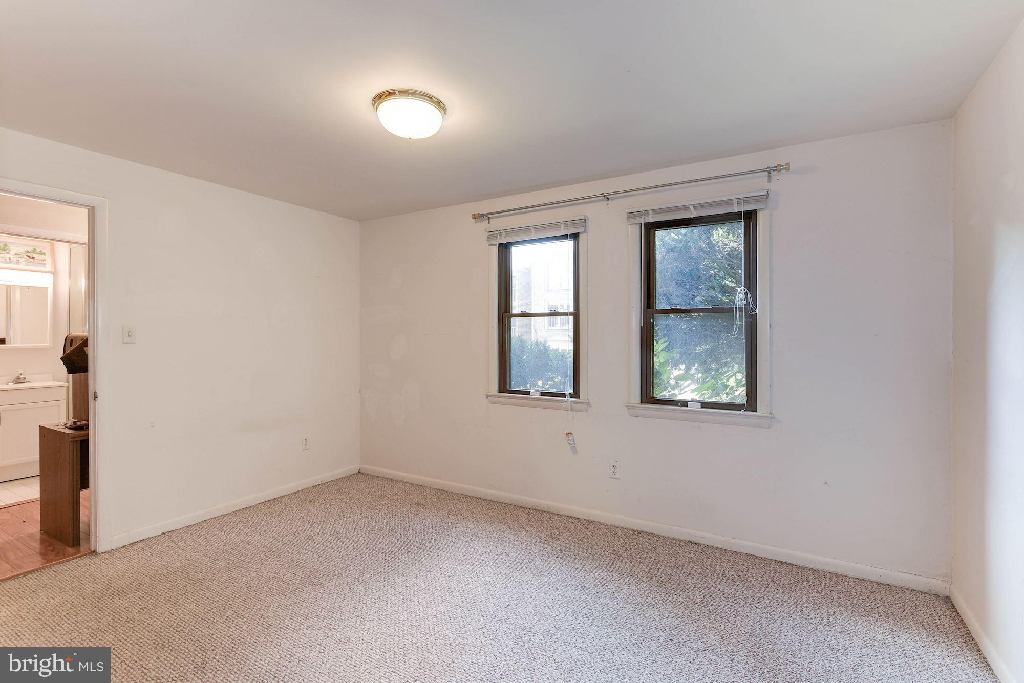 2148 Military Road Arlington, VA 22207 - Photo 21 of 28 an empty room with windows