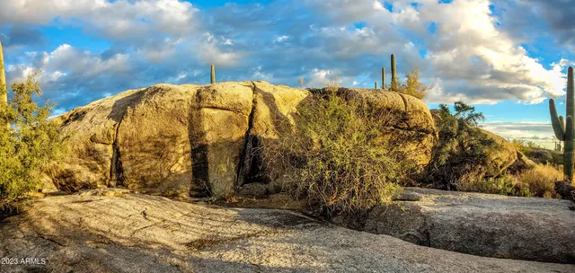 a view of a swimming pool with an outdoor space