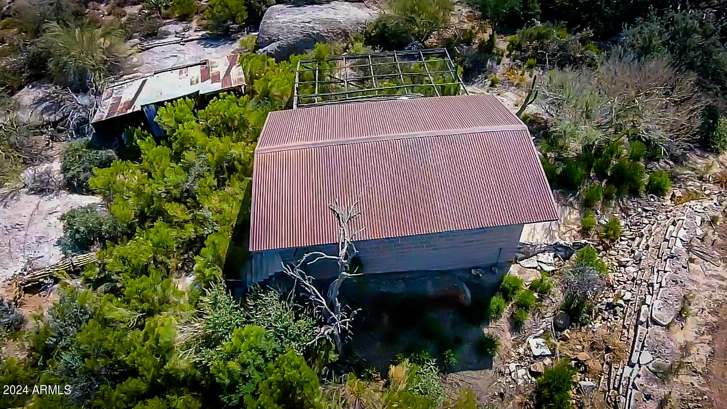 27777 North 95th Street, Unit 1 Scottsdale, AZ 85262 - Photo 52 of 68 an aerial view of a house with a yard and garden