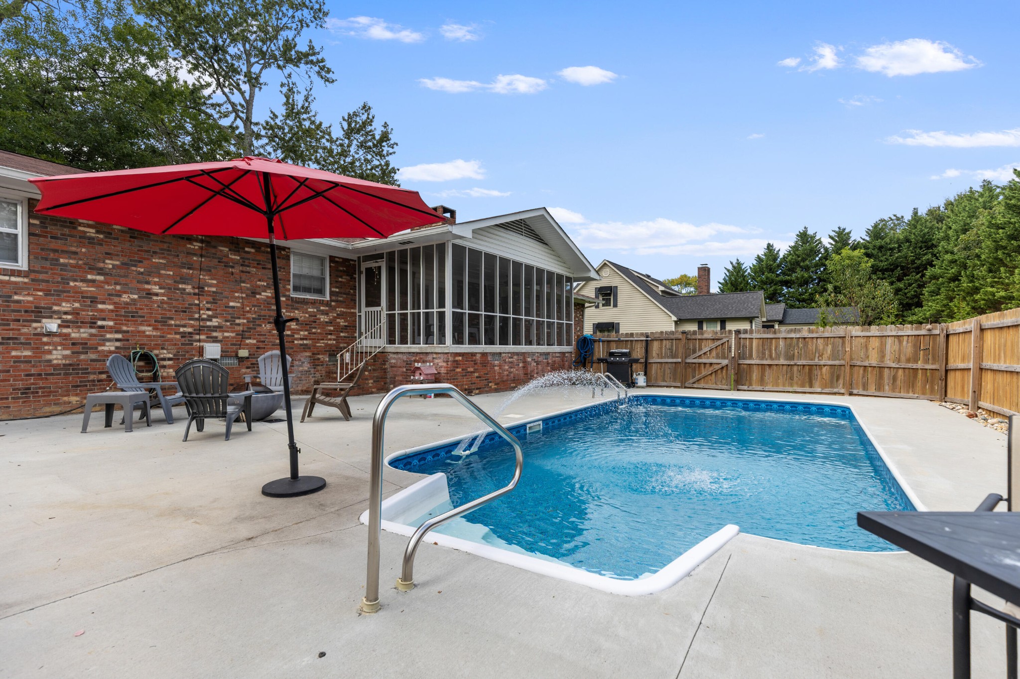 2000 Georgetown Road Northwest Cleveland, TN 37311 - Photo 22 of 36 a view of backyard with swimming pool and furniture