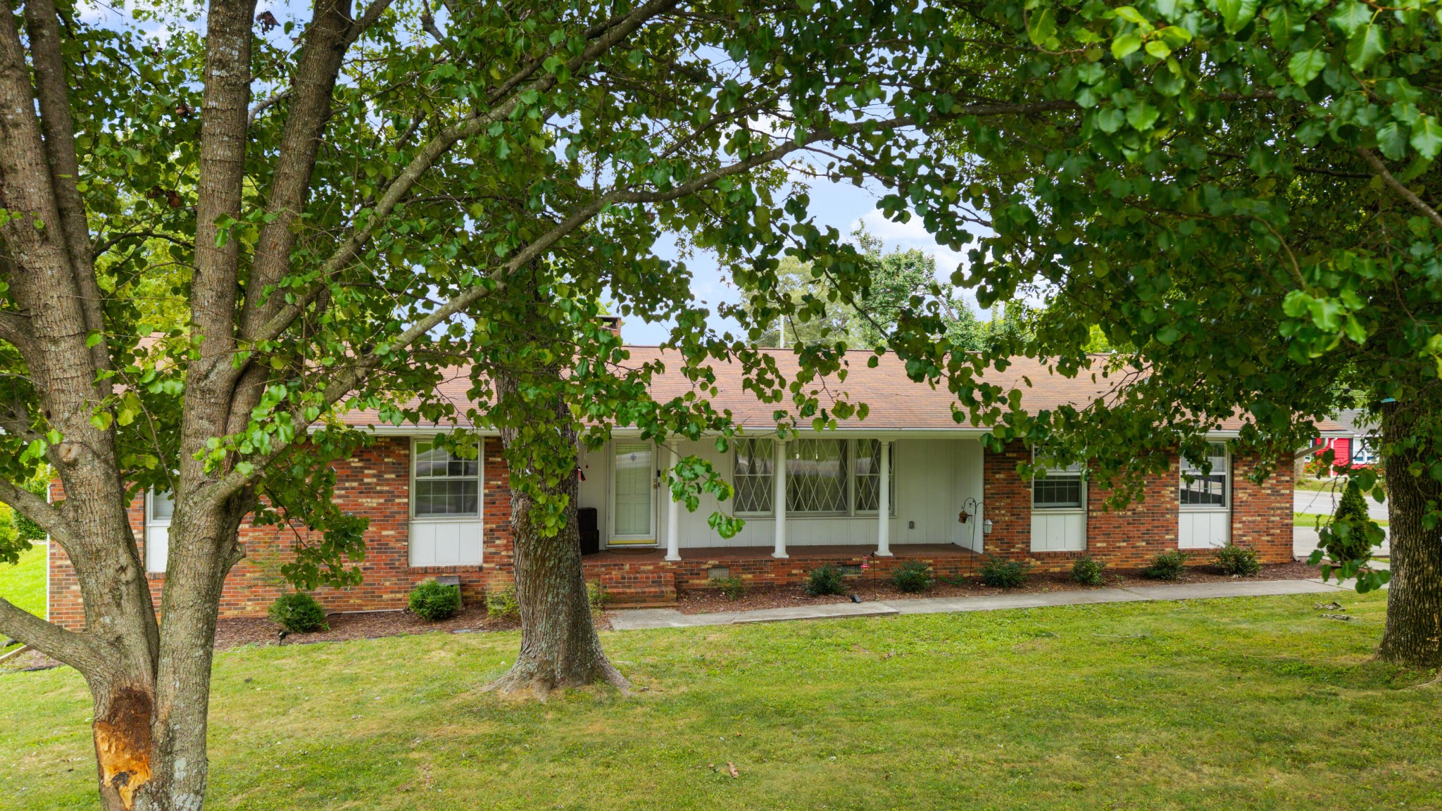 2000 Georgetown Road Northwest Cleveland, TN 37311 - Photo 24 of 36 a front view of a house with a garden