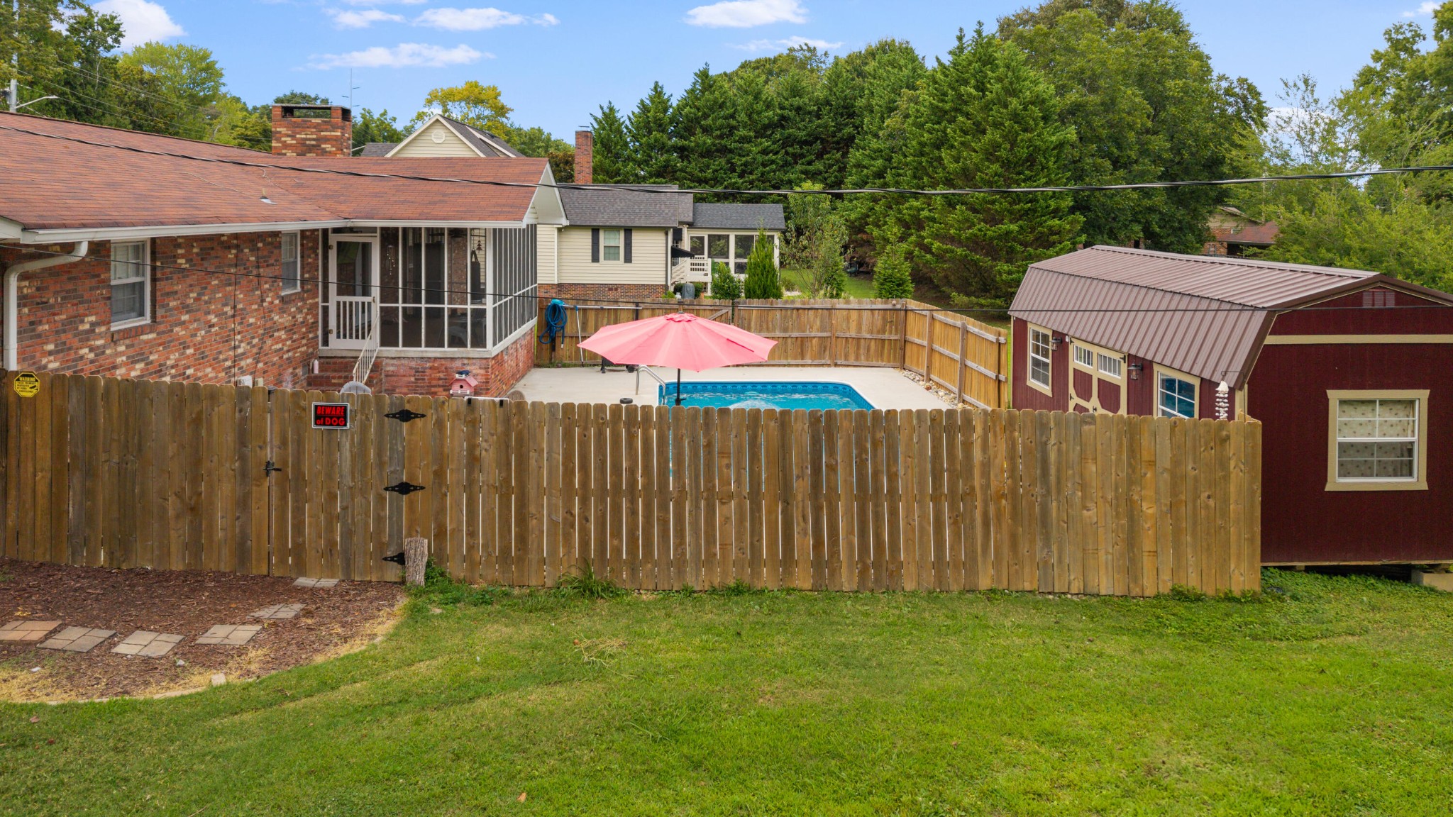 2000 Georgetown Road Northwest Cleveland, TN 37311 - Photo 28 of 36 a backyard of a house with lots of green space and outdoor seating