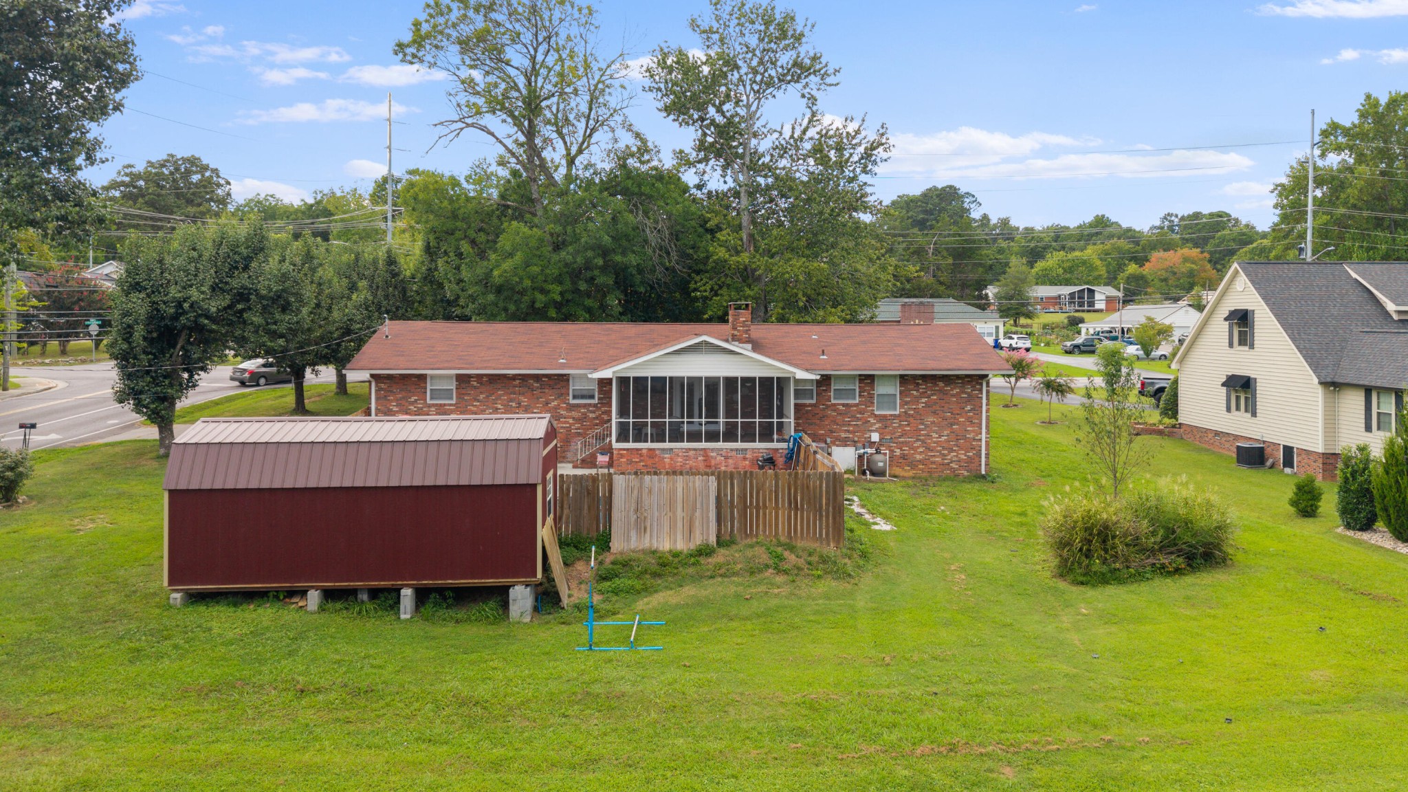 2000 Georgetown Road Northwest Cleveland, TN 37311 - Photo 29 of 36 a aerial view of a house with swimming pool and a yard