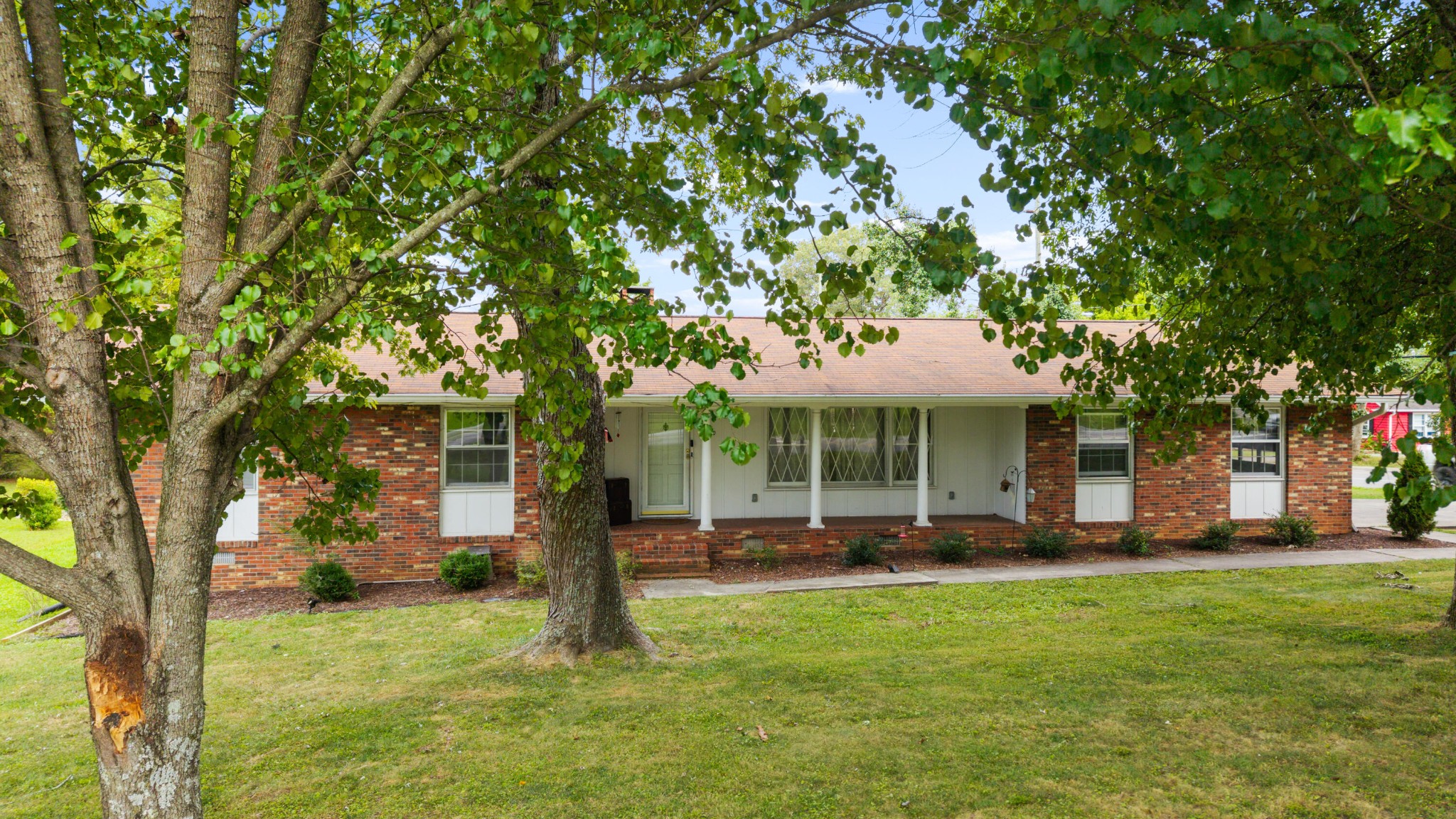 2000 Georgetown Road Northwest Cleveland, TN 37311 - Photo 34 of 36 a backyard of a house with table and chairs