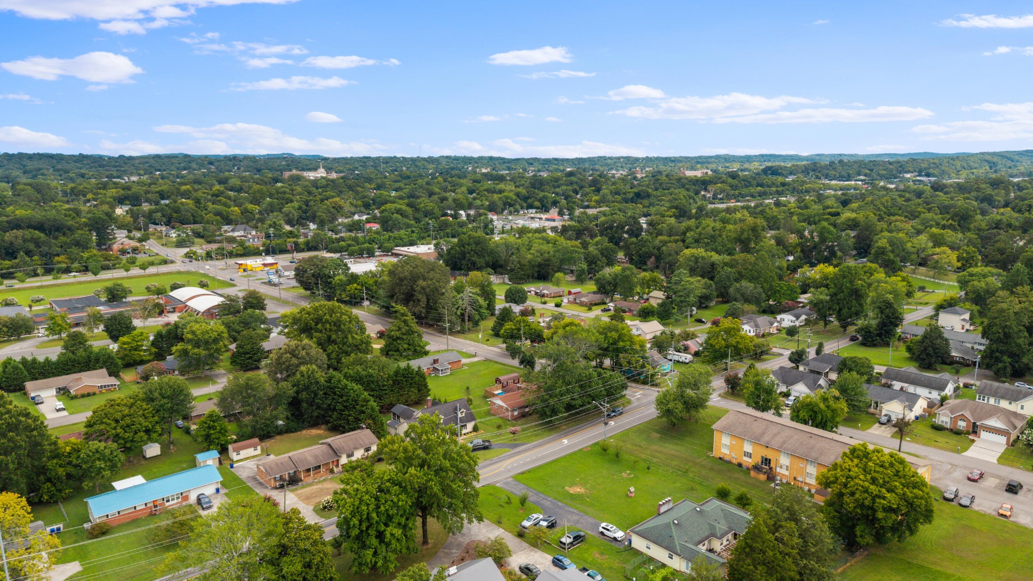 2000 Georgetown Road Northwest Cleveland, TN 37311 - Photo 36 of 36 an aerial view of residential houses with outdoor space and trees