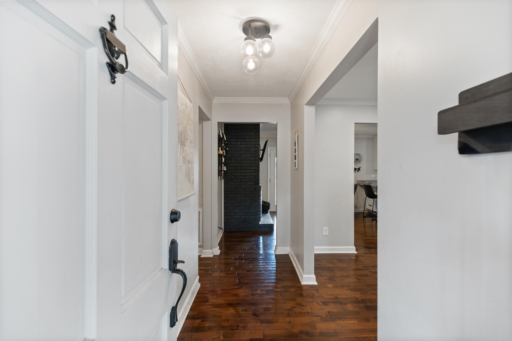 2000 Georgetown Road Northwest Cleveland, TN 37311 - Photo 4 of 36 a view of a hallway with wooden floor and staircase