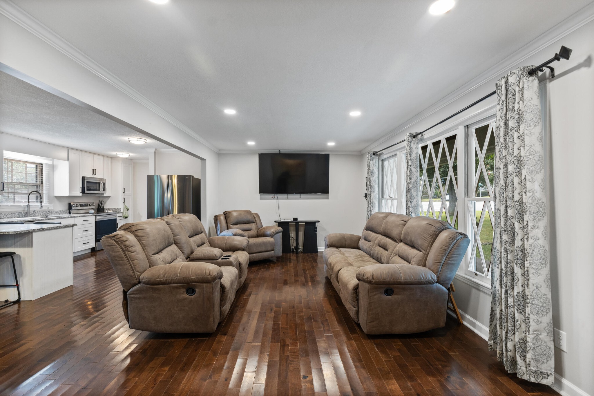 2000 Georgetown Road Northwest Cleveland, TN 37311 - Photo 6 of 36 a living room with furniture and a flat screen tv
