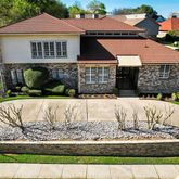 a view of house with outdoor space