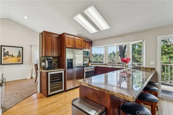a kitchen with granite countertop lots of counter top space