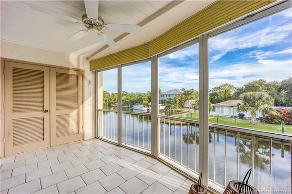 a view of a porch with wooden floor and outdoor space