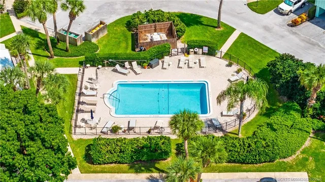 an aerial view of a swimming pool