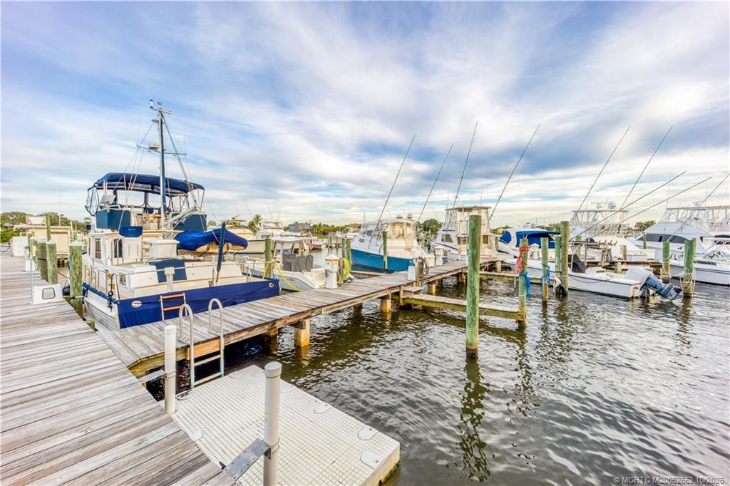 3901 Southeast St Lucie Boulevard, Unit B14 Stuart, FL 34997 - Photo 23 of 37 a view of a swimming pool with sitting area