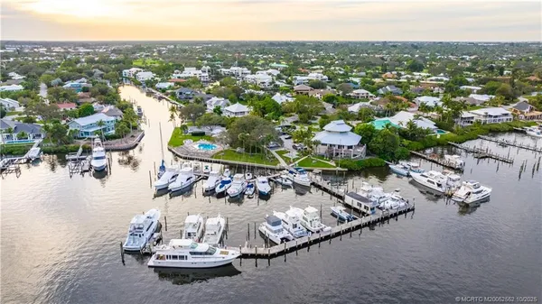 a view of a balcony with wooden floor