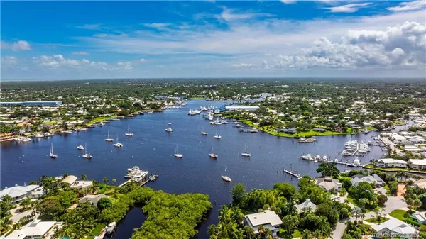a view of a swimming pool with a yard