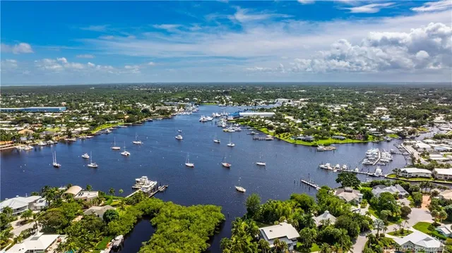 a view of a swimming pool with a yard