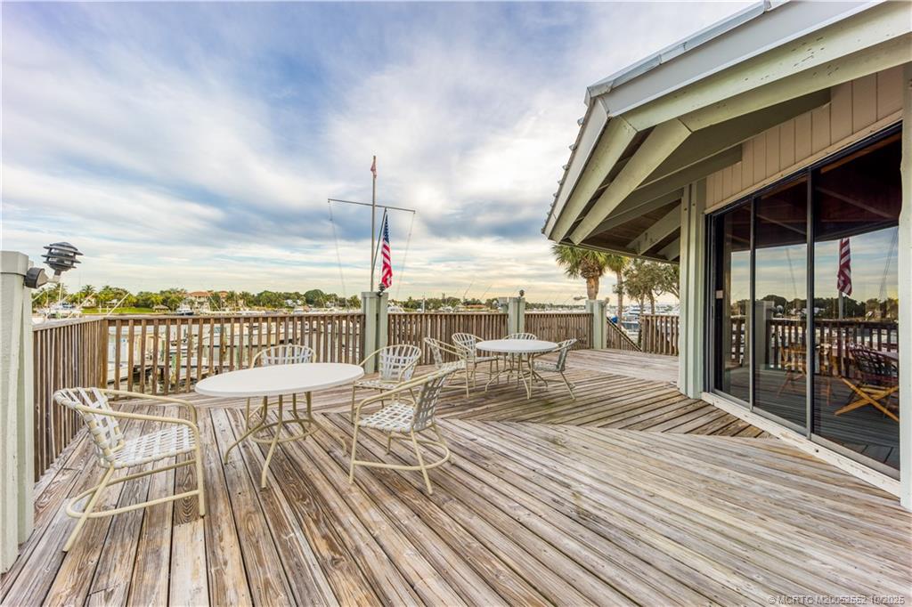 3901 Southeast St Lucie Boulevard, Unit B14 Stuart, FL 34997 - Photo 28 of 37 a view of a balcony with wooden floor
