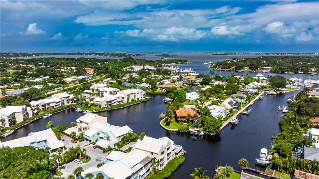 3901 Southeast St Lucie Boulevard, Unit B14 Stuart, FL 34997 - Photo 33 of 37 an aerial view of a houses with yard