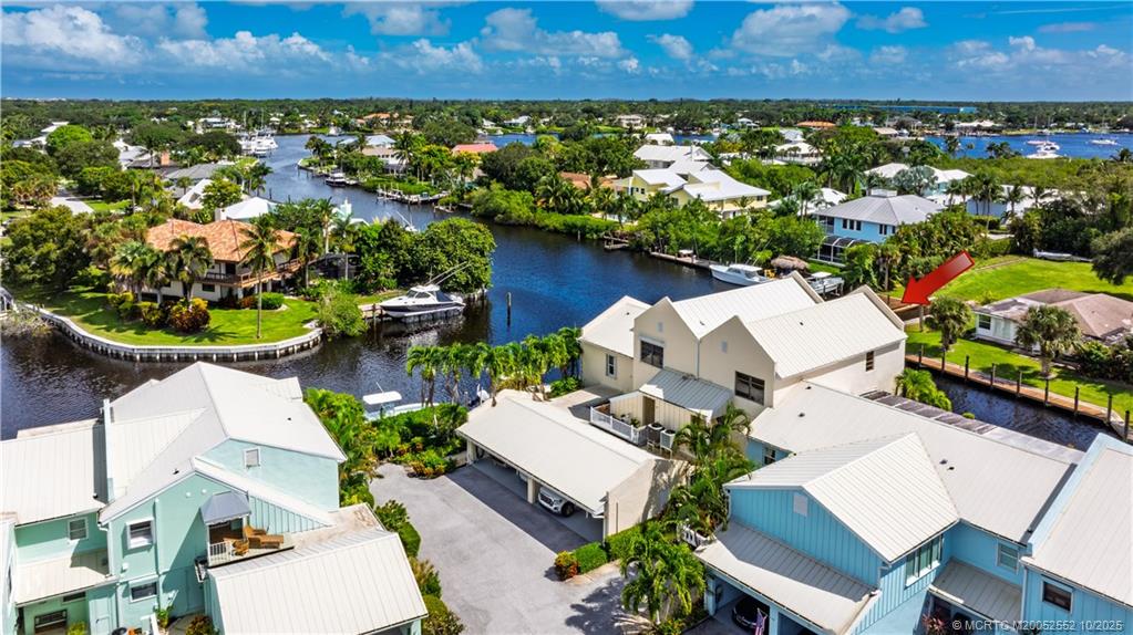 3901 Southeast St Lucie Boulevard, Unit B14 Stuart, FL 34997 - Photo 6 of 37 an aerial view of a house with a garden