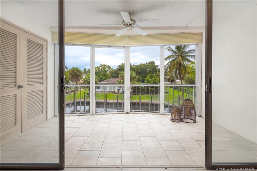 3901 Southeast St Lucie Boulevard, Unit B14 Stuart, FL 34997 - Photo 10 of 37 a view of an empty room and window