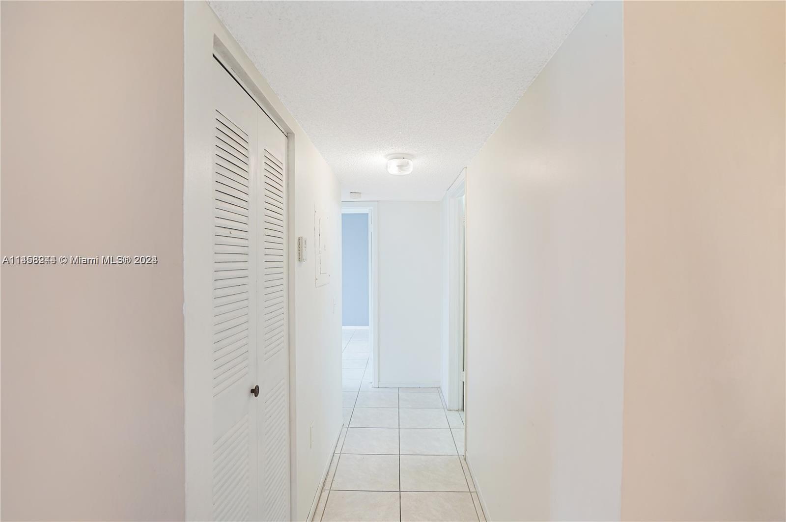 9727 Hammocks Boulevard, Unit 103D Miami, FL 33196 - Photo 9 of 11 a view of a bathroom