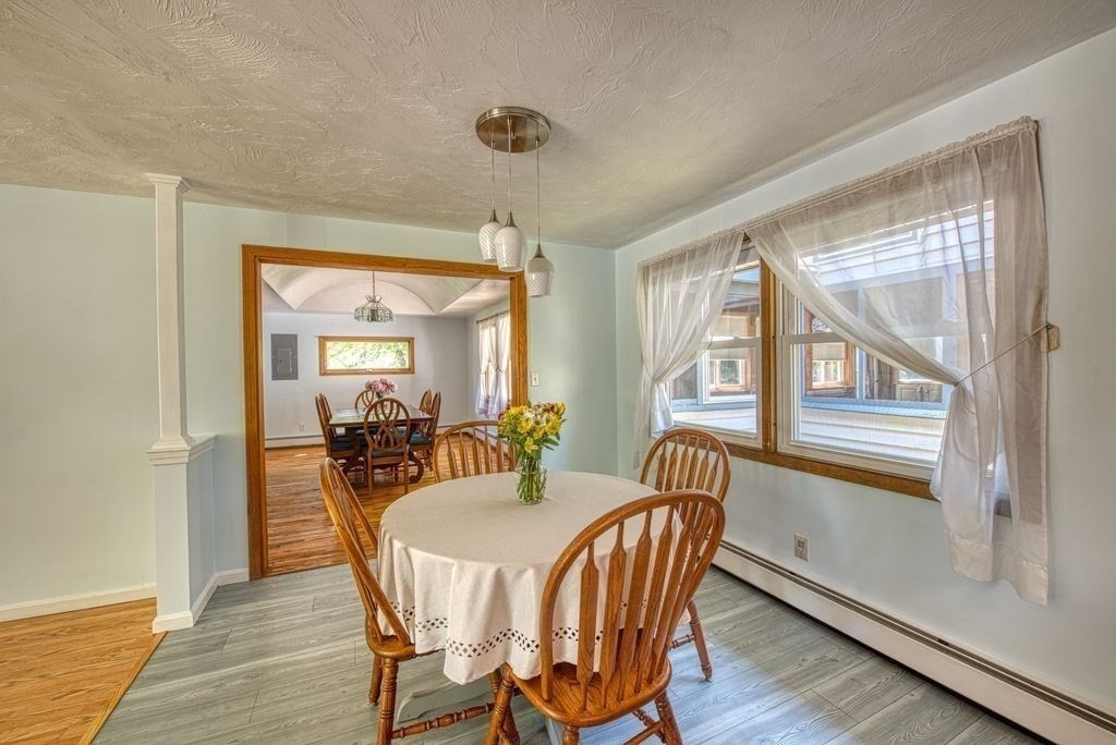 81 Errol Road Brockton, MA 02302 - Photo 22 of 31 a view of a dining room with furniture window and wooden floor
