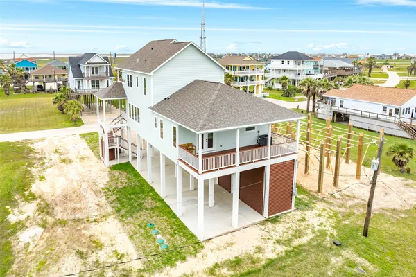 a view of a house with wooden floor and city view