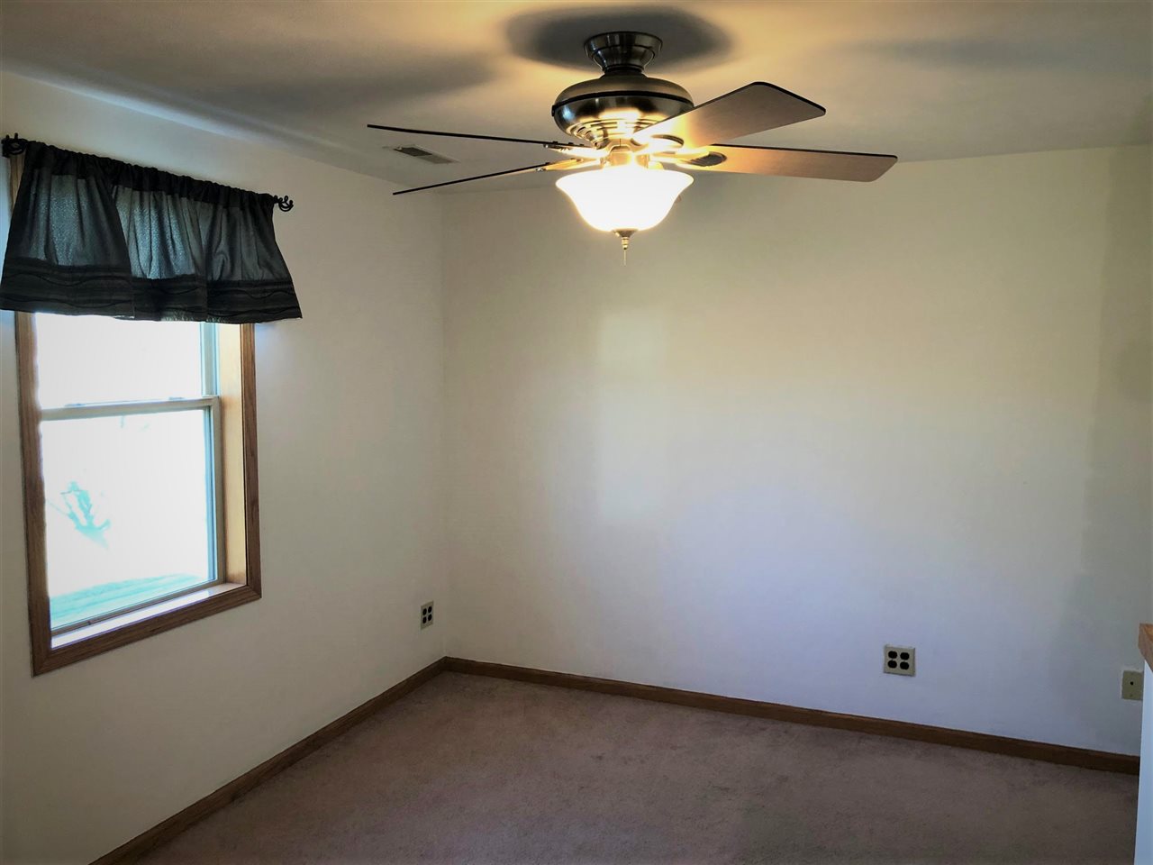 1904 Ridgeland Road Rockford, IL 61108 - Photo 13 of 20 a view of a room with rack on the wall