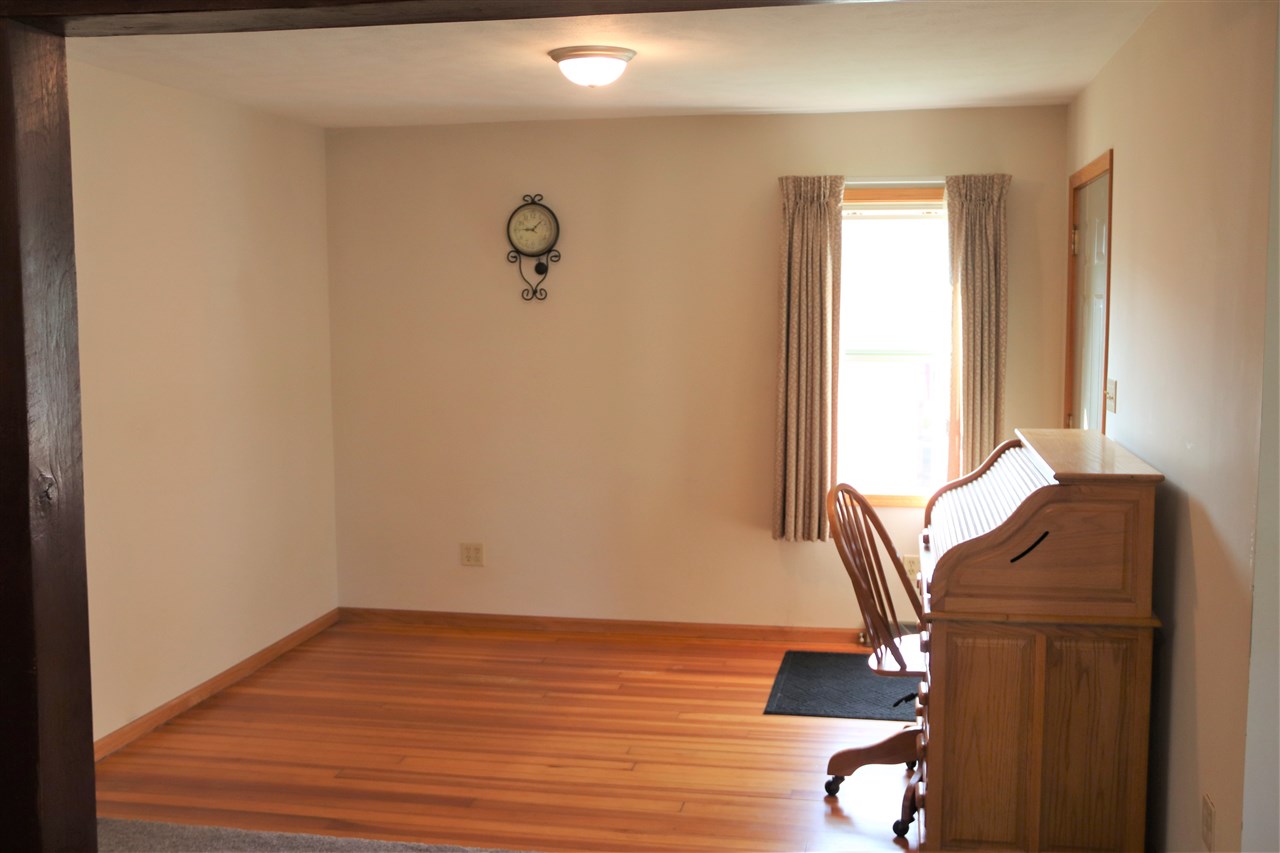 1904 Ridgeland Road Rockford, IL 61108 - Photo 8 of 20 a view of workspace with wooden floor