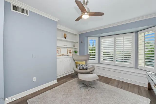 a room with furniture and window