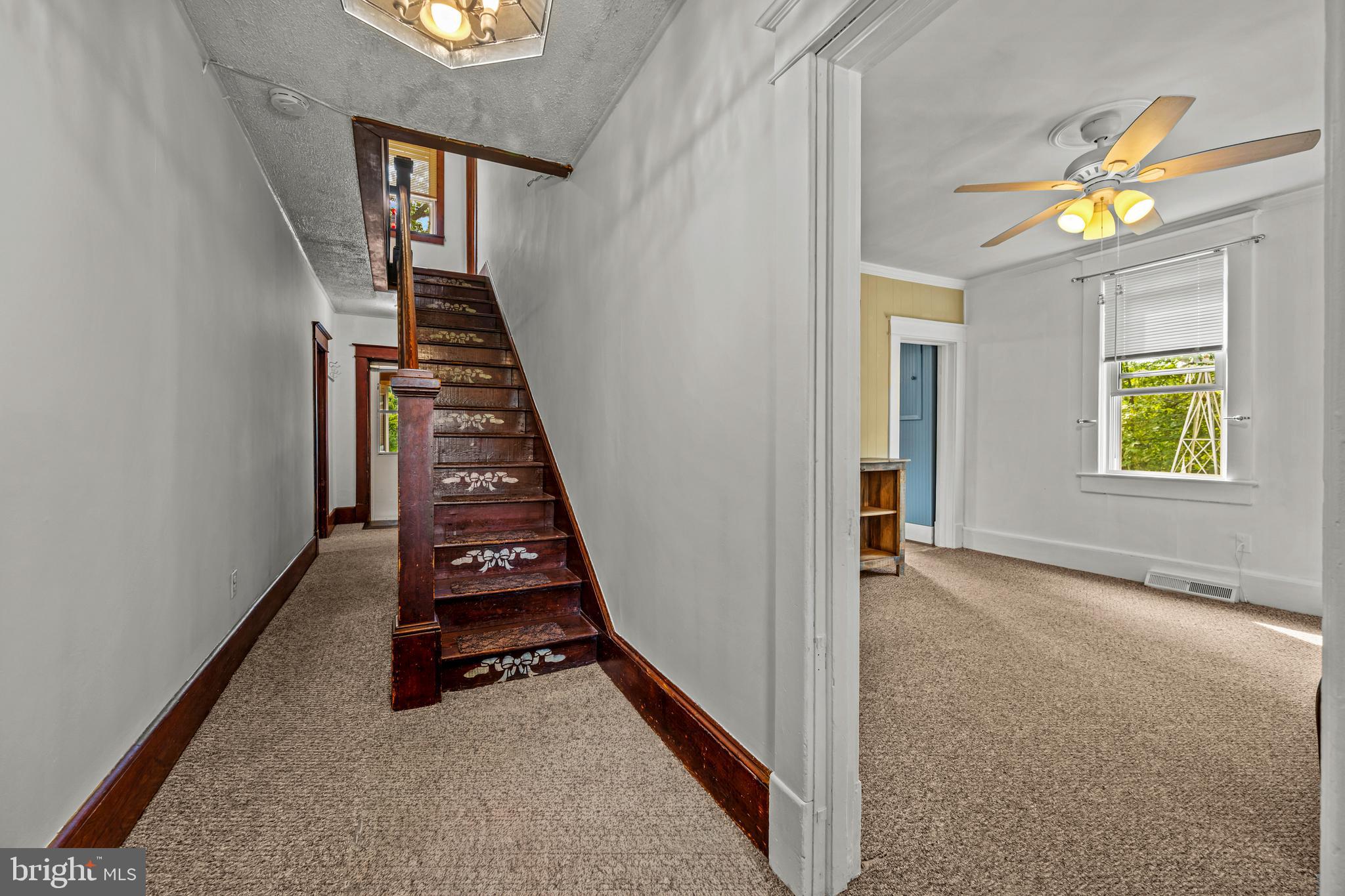 10695 Harding Road Laurel, MD 20723 - Photo 29 of 46 Center Hall Stairwell