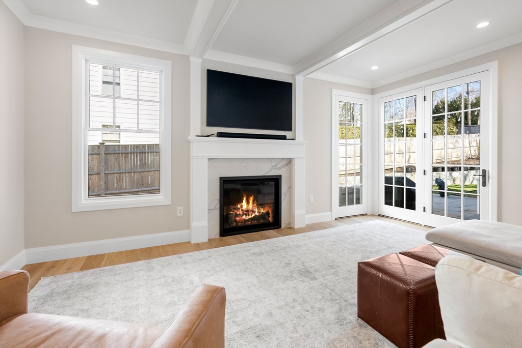 11 Shaw Road Wellesley, MA 02481 - Photo 6 of 22 a living room with furniture window and a fireplace