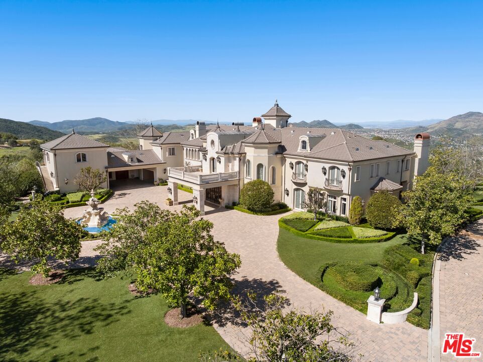 2500 White Stallion Road Thousand Oaks, CA 91361 - Photo 3 of 8 a view of a houses with a city street