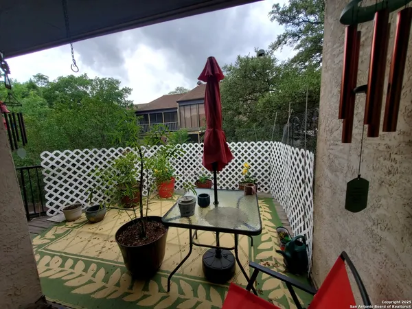 a view of two chairs in patio
