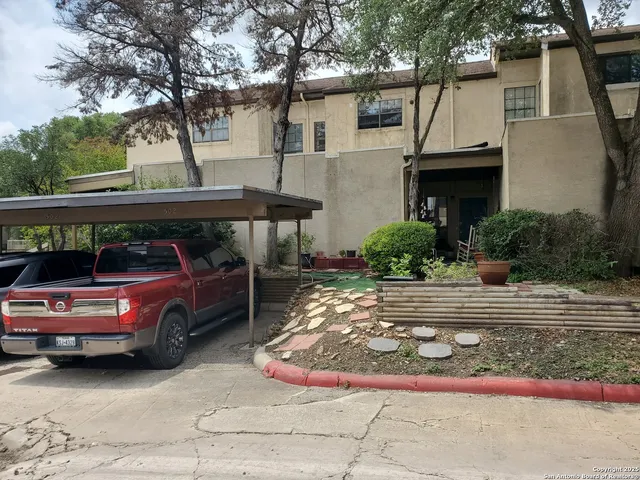 a view of backyard with green space