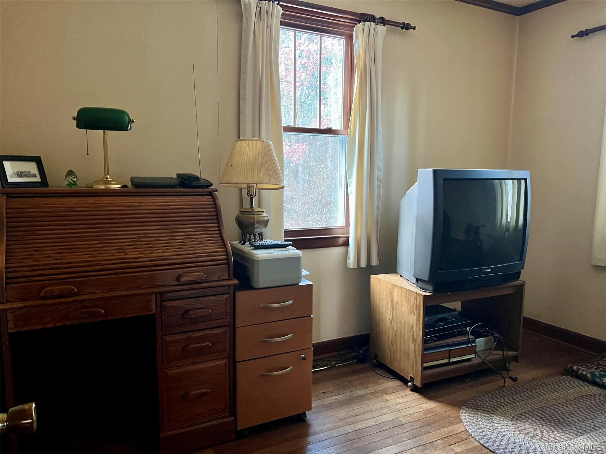 276 Old Hopewell Road Wappingers Falls, NY 12590 - Photo 18 of 28 a room with furniture and wooden floor