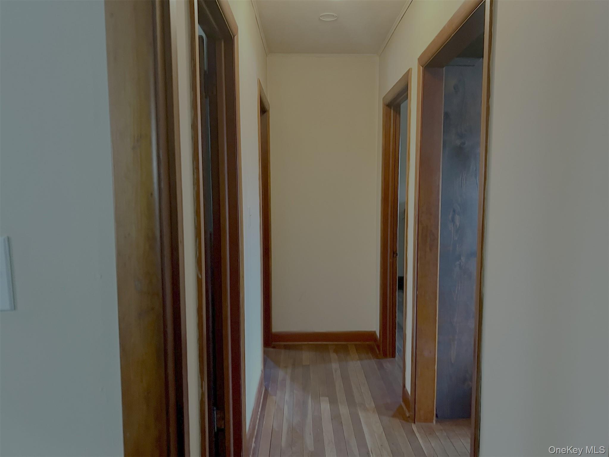 276 Old Hopewell Road Wappingers Falls, NY 12590 - Photo 22 of 28 a view of a hallway with wooden floor