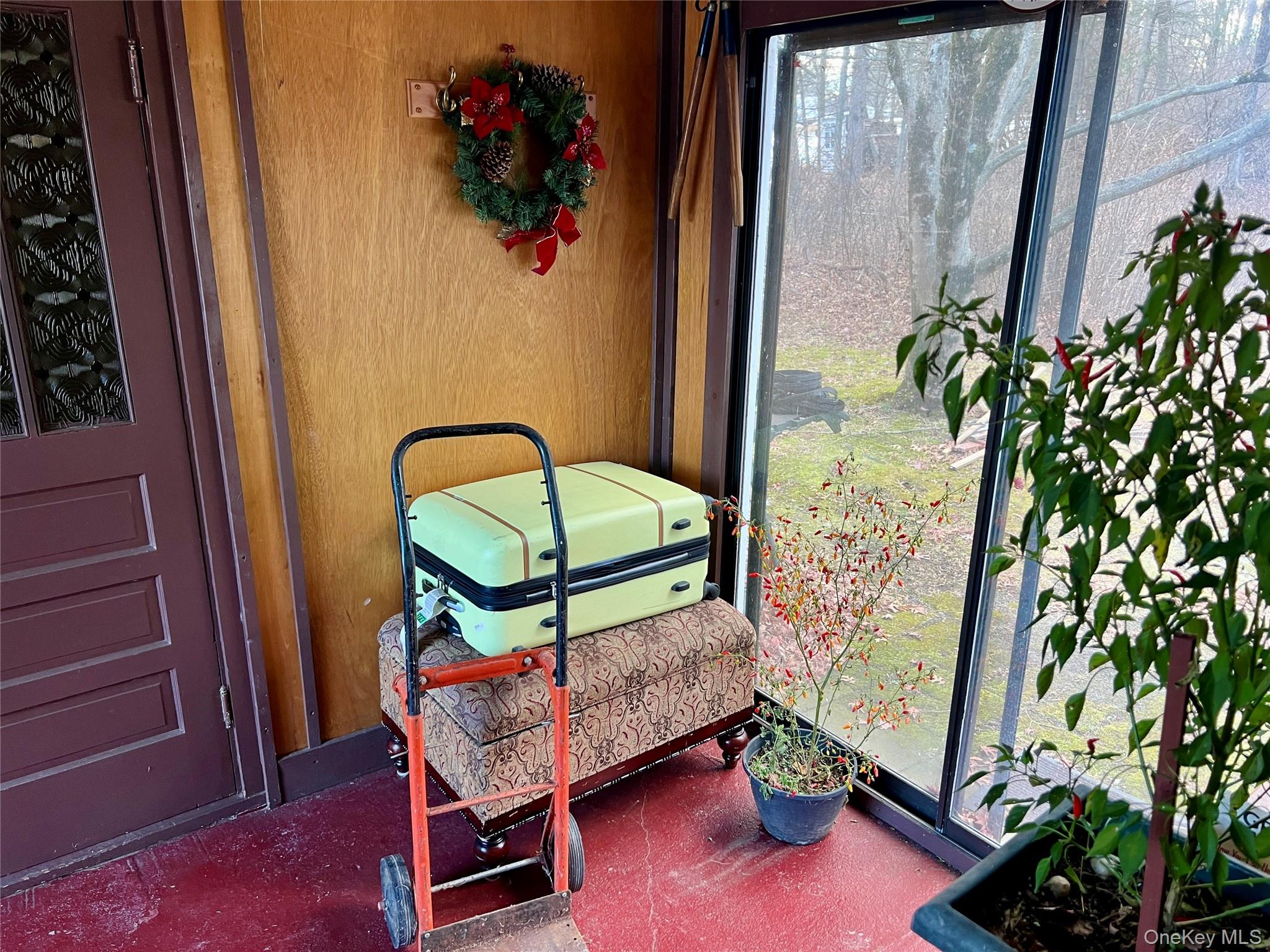276 Old Hopewell Road Wappingers Falls, NY 12590 - Photo 25 of 28 a bedroom with a bed and a potted plant