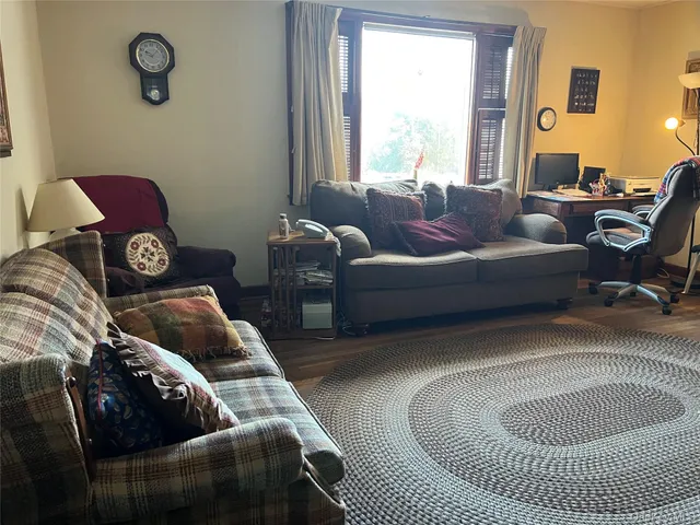 a kitchen with a cabinets and potted plant