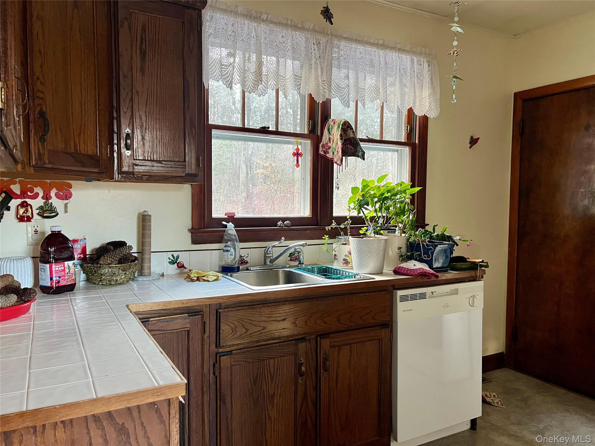 276 Old Hopewell Road Wappingers Falls, NY 12590 - Photo 10 of 28 a kitchen with a sink stove and cabinets
